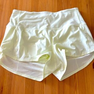 Lululemon size 6 Speed Up shorts in Elixir (very pale yellow)
